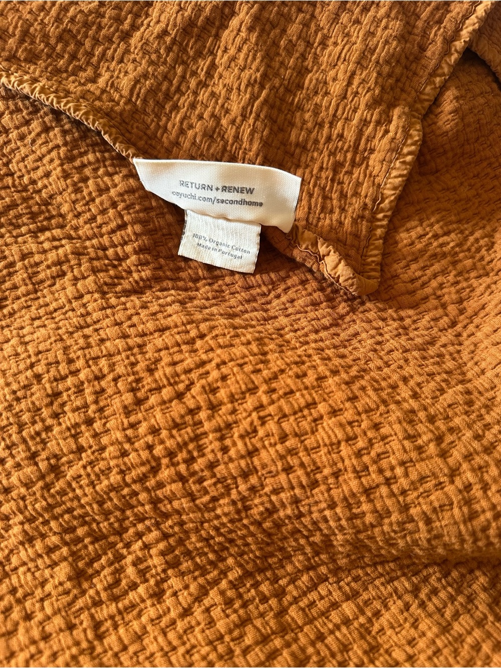 Coyuchi Organic Cotton Throw in Warm Rust Orange - Picture 2 of 3